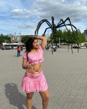 Beautiful Indian Beauty Nikita Sharma Navel in a Pink Mini Skirt and Crop Top Photos 01