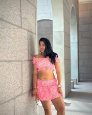 Beautiful Indian Beauty Nikita Sharma Navel in a Pink Mini Skirt and Crop Top Photos 02