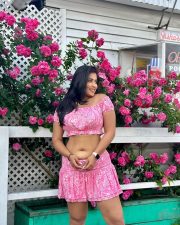 Beautiful Indian Beauty Nikita Sharma Navel in a Pink Mini Skirt and Crop Top Photos 04