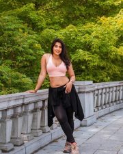 Beautiful Nikita Sharma in a Light Pink Sports Bra and Black Leggings Photos 02