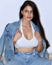 Bold Actress Prakriti Pavani in a White Crop Top and Denim Jacket Photos 02