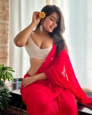 Bold Nikita Sharma Cleavage in a Red Saree with White Blouse Photos 03