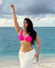 Charming Actress Nikita Sharma in a Pink Bikini Top And White Maxi Sarong Photos 02