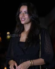 Compelling Actress Tripti Dimri in a Black Polka dot Sheer Sleeve Dress Photos 01