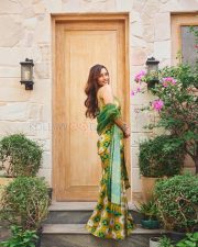 Delightful Actress Tripti Dimri in a Yellow Green Ikat Printed Anarkali Photos 01