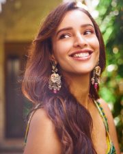 Delightful Actress Tripti Dimri in a Yellow Green Ikat Printed Anarkali Photos 04