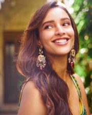 Delightful Actress Tripti Dimri in a Yellow Green Ikat Printed Anarkali Photos 04