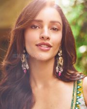 Delightful Actress Tripti Dimri in a Yellow Green Ikat Printed Anarkali Photos 05