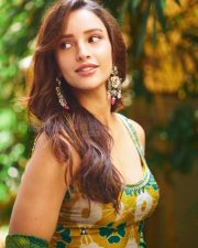 Delightful Actress Tripti Dimri in a Yellow Green Ikat Printed Anarkali Photos 06
