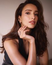 Desirable Actress Triptii Dimri in a Charcoal Pinstripe Halter Neck Vest with a High Waisted Wide Leg Trousers Photos 02