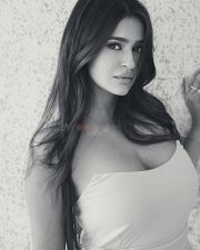 Elegant Actress Prakriti Pavani in a white off shoulder crop top with white sheer skirt photos 01