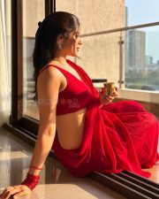 Enchanting Actress Nikita Sharma in a Red Backless Saree Blouse Photos 01