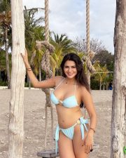 Erotic Prakriti Pavani in a Light Blue Seashell Halter Bikini Top with a Tie Side Bikini Bottoms Photos 02