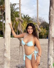 Erotic Prakriti Pavani in a Light Blue Seashell Halter Bikini Top with a Tie Side Bikini Bottoms Photos 02