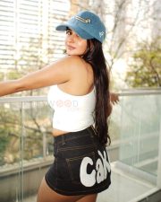 Fashionable Actress Prakriti Pavani in a White Crop Top and Denim Shorts Photos 04