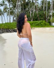 Glam Nikita Sharma in a White Bra and Transparent Pants at the Beachside Photos 01