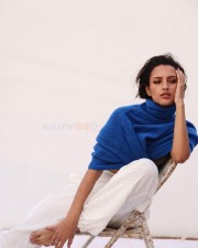 Glam Tripti Dimri Showing Navel in a Blue Sweater Photos 05