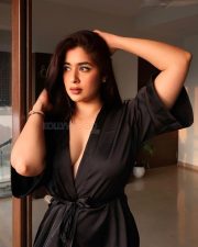 Glamorous Television Actress Nikita Sharma in a Short Black Silk Kimono Style Robe with a Deep Cleavage Pictures 04