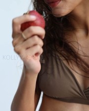 Gorgeous Tripti Dimri Eating Apple in a Chocolate Bikini Photos 03