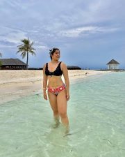 Hot Beauty Nikita Sharma in a Printed Bikini Bottom and Black Bikini Bralette Pictures 04