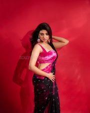 Idhayam Murali Actress Pragya Nagra in a Pink and Black Printed Saree with a Sleeveless Pink Blouse Pictures 03