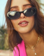 Luminous Actress Tripti Dimri in a Hot Pink Blazer and White Top with Miu Miu Sunglasses Photos 01