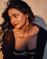 Modern Prakriti Pavani in a Beige Strapless Corset Top with a Dark Brown Grey Open Knit Cardigan and Light Trousers Pictures 04