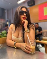 Provocative Nikita Sharma Cleavage in a Beige Ribbed Square Neck Tank Top Photos 03
