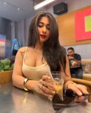 Provocative Nikita Sharma Cleavage in a Beige Ribbed Square Neck Tank Top Photos 04