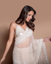 Qala Heroine Tripti Dimri in a White See Through Embellished Saree with a White Sequin Bralette Photos 08