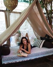 Radiant Actress Prakriti Pavani in a Brown Triangle Bikini Photos 02