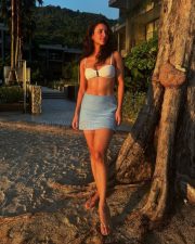 Romantic Tripti Dimri in a White Bikini Top with a Light Blue Mini Skirt Vacation Photos 02