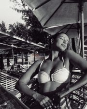Romantic Tripti Dimri in a White Bikini Top with a Light Blue Mini Skirt Vacation Photos 05