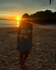 Romantic Tripti Dimri in a White Bikini Top with a Light Blue Mini Skirt Vacation Photos 07