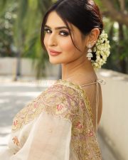 Sensual Prakriti Pavani in an Ivory and Gold Embroidered Lehenga Saree with a Sleeveless Deep V Neck Blouse Photos 02