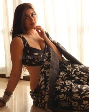 Sensuous Nikita Sharma in a Black Floral Saree with a Black Sleeveless Blouse Stills 02