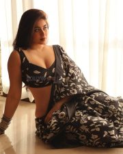 Sensuous Nikita Sharma in a Black Floral Saree with a Black Sleeveless Blouse Stills 03