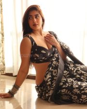 Sensuous Nikita Sharma in a Black Floral Saree with a Black Sleeveless Blouse Stills 08