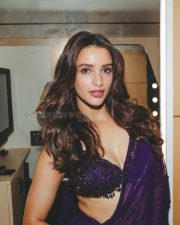Sensuous Tripti Dimri in a Vibrant Purple Saree with a Sleeveless Deep Cleavage Blouse Photos 01