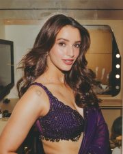 Sensuous Tripti Dimri in a Vibrant Purple Saree with a Sleeveless Deep Cleavage Blouse Photos 03