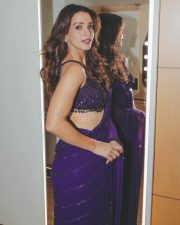 Sensuous Tripti Dimri in a Vibrant Purple Saree with a Sleeveless Deep Cleavage Blouse Photos 05