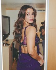 Sensuous Tripti Dimri in a Vibrant Purple Saree with a Sleeveless Deep Cleavage Blouse Photos 06