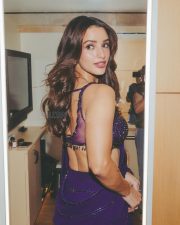 Sensuous Tripti Dimri in a Vibrant Purple Saree with a Sleeveless Deep Cleavage Blouse Photos 06