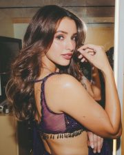 Sensuous Tripti Dimri in a Vibrant Purple Saree with a Sleeveless Deep Cleavage Blouse Photos 09