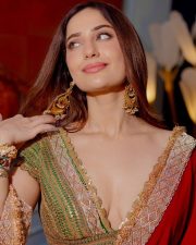 Sexy Actress Kusha Kapila in a Vibrant Red Saree with a Green Plunging Neckline Blouse Photos 02