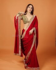 Sexy Actress Kusha Kapila in a Vibrant Red Saree with a Green Plunging Neckline Blouse Photos 09