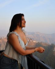 Sexy Actress Nikita Sharma in a Powder Blue Mist Top with a Deep Cleavage and Dark Blue Denim Jeans Photos 02