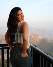 Sexy Actress Nikita Sharma in a Powder Blue Mist Top with a Deep Cleavage and Dark Blue Denim Jeans Photos 05