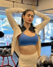Sexy Actress and Model Prakriti Pavani in a Blue Sports Bra with a Beige Zip Up Jacket and High Waisted Leggings Pictures 01
