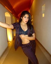Striking Actress Nikita Sharma in a Dark Satin Blazer Crop Top Photos 03